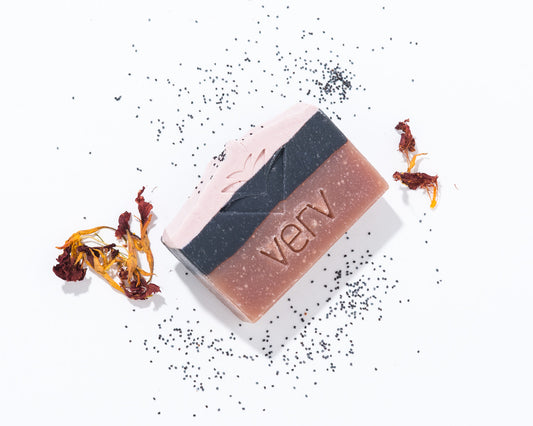 The Artist Soap bar without packaging. Scented with earthy patchouli and fragrant lavender with a hint of rich clove oil. 